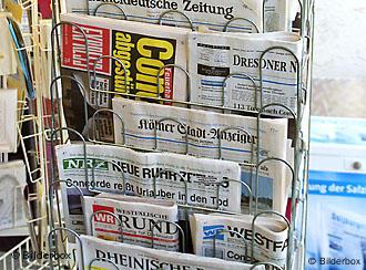 A rack of German newspapers