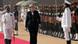 German Chancellor Angela Merkel inspects the guard of honor in New Delhi