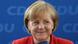 a smiling Chancellor Merkel