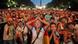 German fans react watching the World Cup soccer match between Germany and Spain at a public viewing area in Berlin